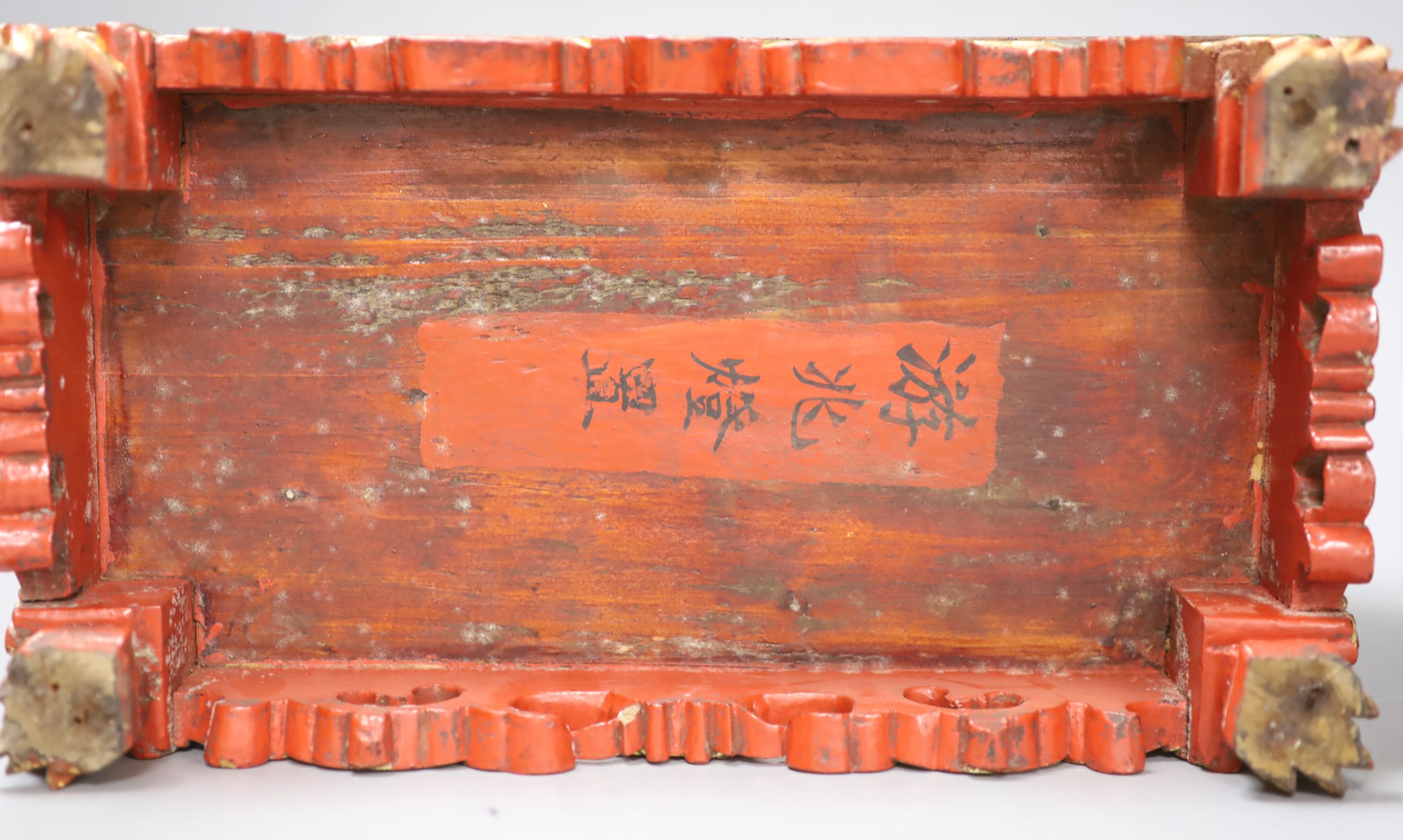 A 19th century Chinese red lacquer and gilt offering box (chanab), length 33cm